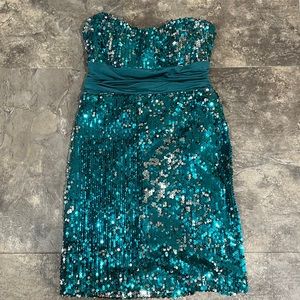 green sequence open back dress